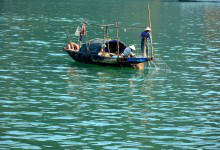 Halong bay fisherman - photo by Renata Blonska - 825V