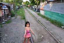 Living on the railway, a girl and her hula hoop – photo by Renata Blonska