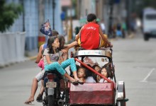 11 travelers and one tricycle, popular way of transportation in Philippines – photo by Renata Blonska