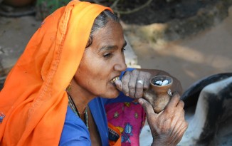 Abhaneri village woman smoking clay pipe - photo by Renata Blonska